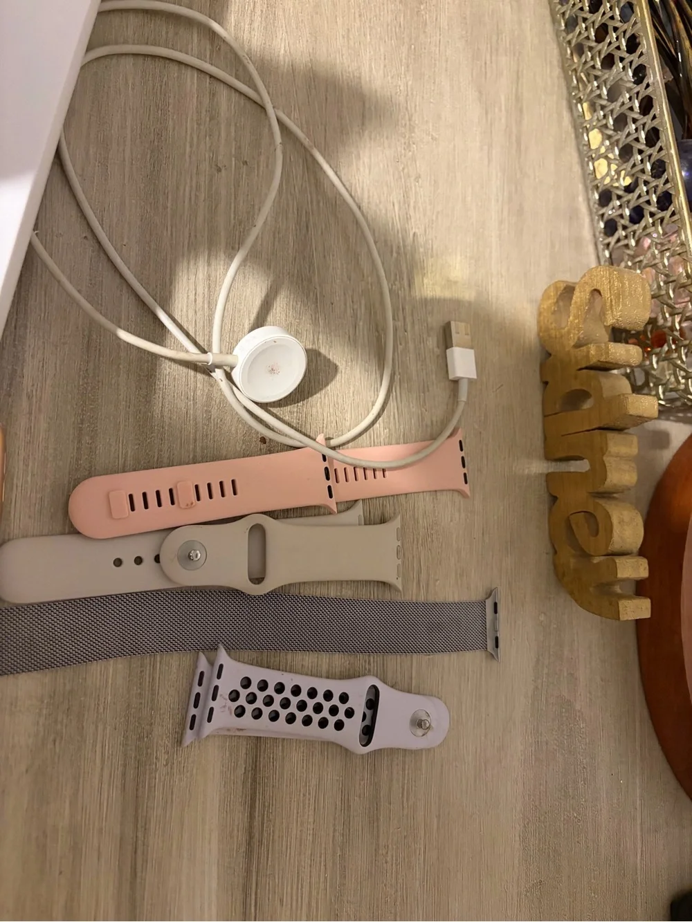 Apple Watch with Pink Sport Band and Multiple Additional Bands